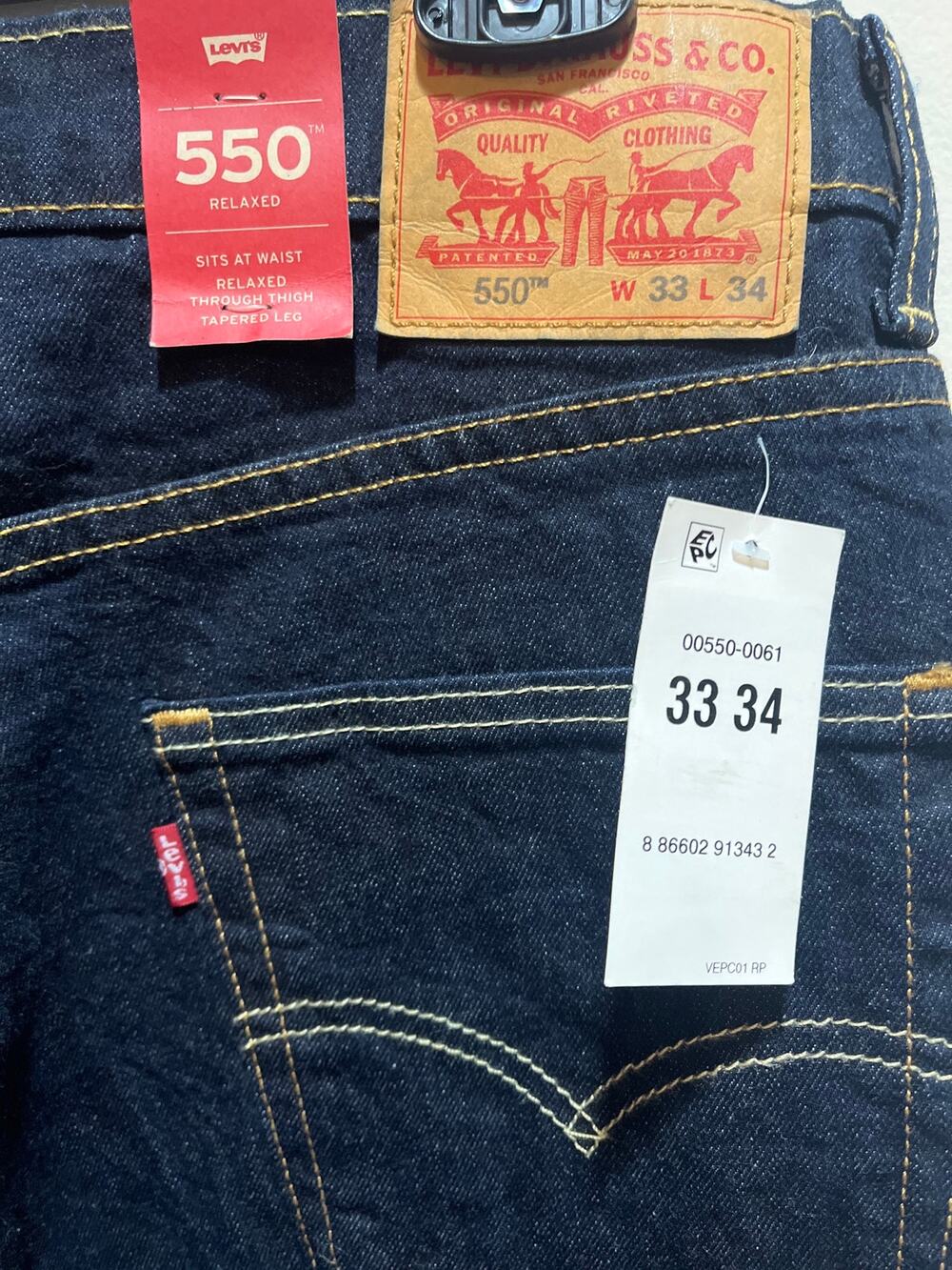 Levi’s 550 Relaxed Fit Tapered Leg Dark Rinsed Denim Jeans Men’s 33x34